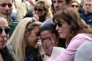 A protester cries during an anti-bailout rally by employees of Cyprus Popular Bank outside the parliament in Nicosia March 22, 2013.
