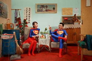 Maleonn's studio mobile: A couple wearing matching Superman outfits