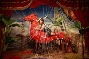 Maleonn's studio mobile: A woman on horse surrounded by threads