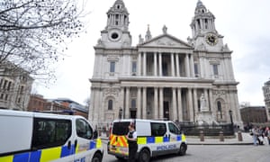 Police officers outside St. Paul's Cathedral in the City of London as preparations are underway for the funeral of former British Prime Minister Margaret Thatcher.