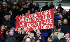 Some Liverpool fans make their feelings clear about the death of Margaret Thatcher during the Barclays Premier League match at the Madejski Stadium, Reading.