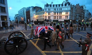 A Gun Carriage of the King's Troop Royal Horse Artillery passes through Ludgate Circus during a rehearsal for the ceremonial funeral of Lady Thatcher.