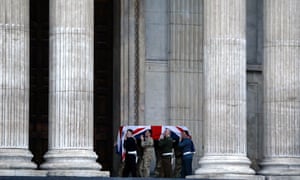 British forces' officers carry a Union Jack-draped coffin outside St Paul's Cathedral in central London during the rehearsal for Lady Thatcher's funeral.