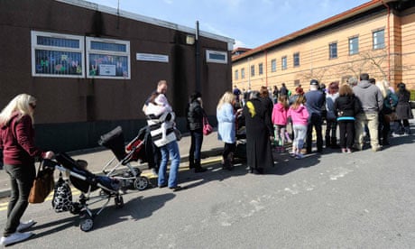 Parents and children queue outside Morriston Hospital in Swansea