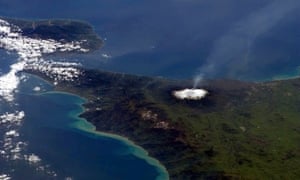 This NASA image taken by Canadian astronaut Chris Hadfield on board the International Space Staion, shows a plume of smoke coming from Mt. Etna in Sicily, Italy.