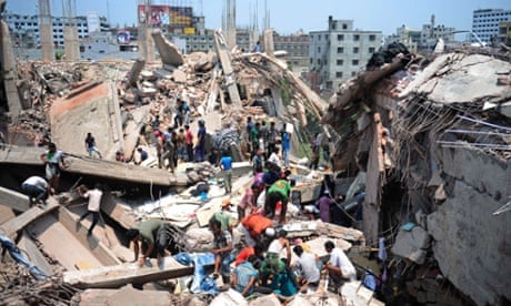 Bangladeshi civilian volunteers assist in the rescue operation after an eight-storey building collapsed in Savar, on the outskirts of Dhaka. At least 15 people were killed and many more feared dead when the building housing a market and garment factory collapsed.