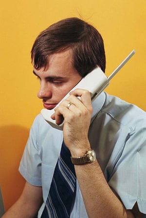 Mobile 40th: Product designer with Motorola DynaTAC mobile concept phone in 1972