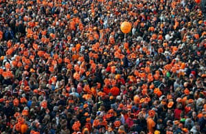 Netherlands inauguration: An orange balloon is seen above the crowd 