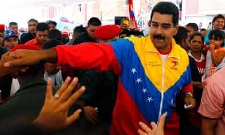 Nicolas Maduro greets supporters in Caracas
