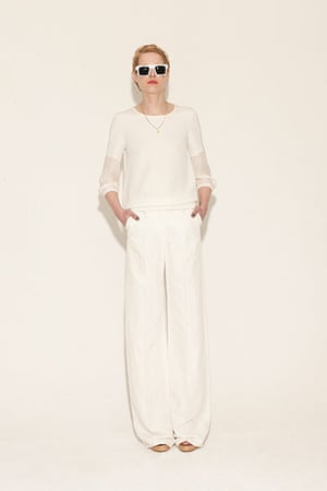 All Ages: white top white wide legged trousers sunglasses