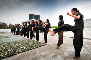 Members of the Red Brigade in a martial arts training session