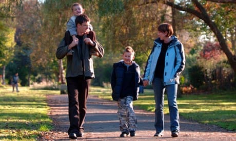 Family walking in a park 