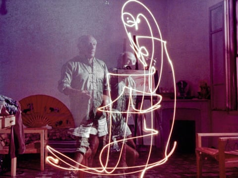 Triple exposure of artist Pablo Picasso drawing with light at his home in Vallauris