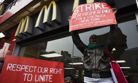 Fast food workers protesting low wages in Harlem, New York, April 2013