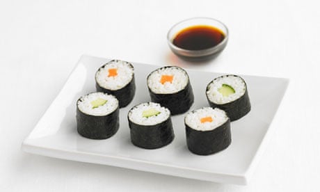 Sushi with soy sauce.