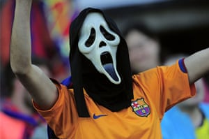 Barca groundstaff: A supporter of Barcelona wearing a scream mask