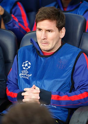 Barca groundstaff: Lionel Messi sits on the bench