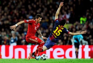 barca v bayern 2: Marc Bartra goes to ground after being outfoxed by Mario Mandzukic