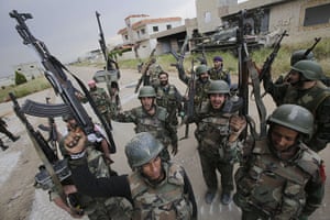 Syrian troops in Homs: Syrian troops retake village in Homs 