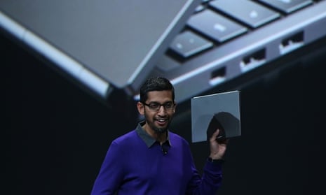 Sundar Pichai holds a Google Chromebook Pixel