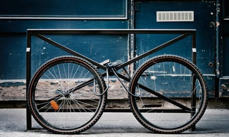 Bicycle Wheels Locked to Bike Rack