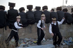 Jewish Wedding: Ultra-Orthodox boys play around spectators