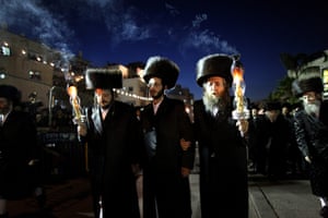 Jewish Wedding: The Ultra Orthodox Jewish groom (C) is accompanied by his relative