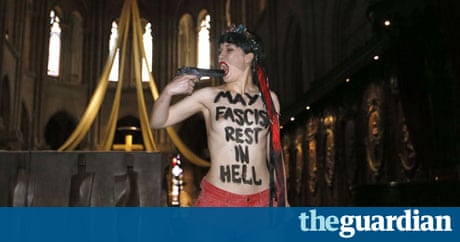 Femen protester stages mock suicide at Notre Dame  Femen protester stages mock suicide at Notre Dame