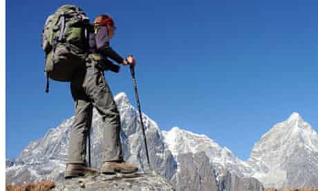 A female trekker trekking in the Everest region