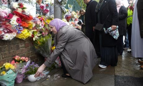 Members of Muslim groups at the memorial site for British soldier Lee Rigby.