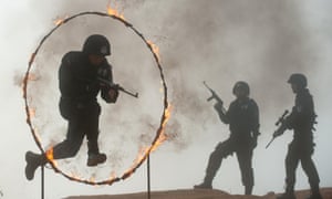 Members of SWAT team receive training in Jingning, China. Not sure how often they'll have to jump through flaming hoops but better to be prepared!