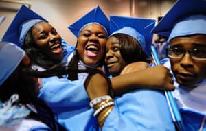 Newly minted Glenn Hills High School graduates celebrate after picking up their diplomas following commencement at the James Brown Arena in Augusta, Georgia, United States.