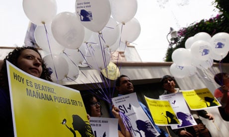 Rights groups protest outside the El Salvador embassy in Mexico City to support abortion request