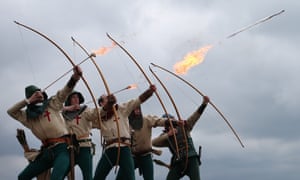Purbrook Bowmen fire a volley of flaming arrows from Southsea Castle as part of a day of events to mark the opening of the Mary Rose museum in Portsmouth, England. The wreck of the Mary Rose was rediscovered in 1971 and raised in 1982. The Mary Rose museum in Portsmouth's historic dockyard is the new home of the warship and some of the 19,000 artefacts that sank with her.