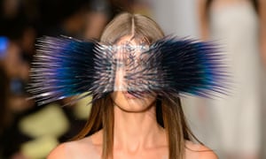 A model wears a design by Maiko Takeda during the Royal College of Art graduate fashion show in Kensington, west London.