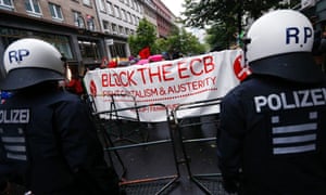 Police stand guard during an anti-capitalist "Blockupy" demonstration near the European Central Bank (ECB) headquarters in Frankfurt, May 31, 2013