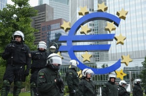 Riot police stand outside the headquarters of the European Central Bank (ECB) during Blockupy protests on May 31, 2013 in Frankfurt am Main, Germany.
