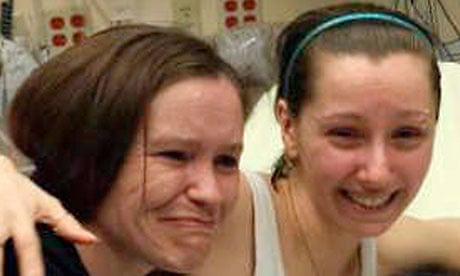 Amanda Berry (right) reunited with her sister after being found in Cleveland, Ohio