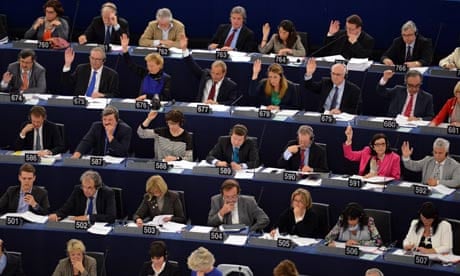 Members of the Parliament vote at the European Parliament in Strasbourg, France