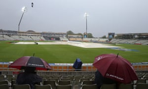 Covers on the pitch as rain delays play during the Champions Trophy match between Australia and New Zealand at Edgbaston.