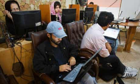 Customers at an internet cafe in Tehran 9/5/11