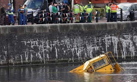 The amphibious tour bus almost submerged in Albert Dock.