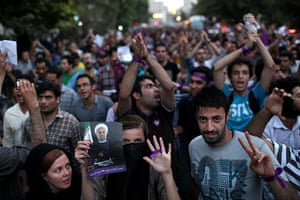Rouhani supporters sing and dance on the streets of the Iranian capital