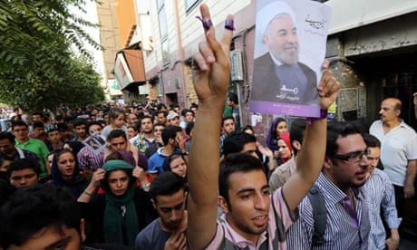 Supporters of Iran's newly-elected president, Hassan Rouhani