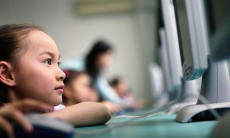Schoolgirl Working on Computer