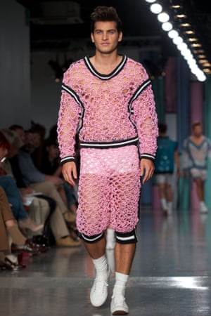 Now this is an eye-catching look: the pretty in pink model is presenting a creation by Sibling during the London Collections Men's fashion week.