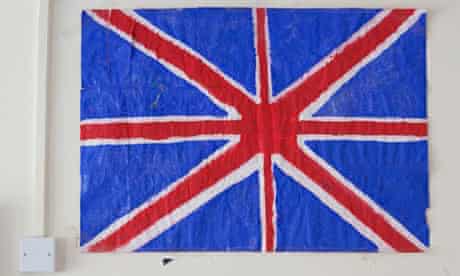 A flag on the wall of the centre in Kent for young asylum seekers