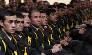 Afghan defence officers attend a security handover ceremony at a military academy outside Kabul. Afghanistan will send a team to Qatar for peace talks with the Taliban as the U.S. and NATO coalition launched the final phase of the 12-year war with the last round of security transfers to Afghan forces.