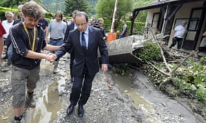 French president Francois Hollande visits the village of Saint-Beat two days after it was submerged by flash flooding. The floods in southwestern France claimed two elderly victims in the space of 24 hours and has forced the temporary closure of the religious grotto at Lourdes.
