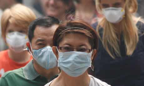 Shoppers in Sinagpore take cover as record levels of haze continues to blanket the country